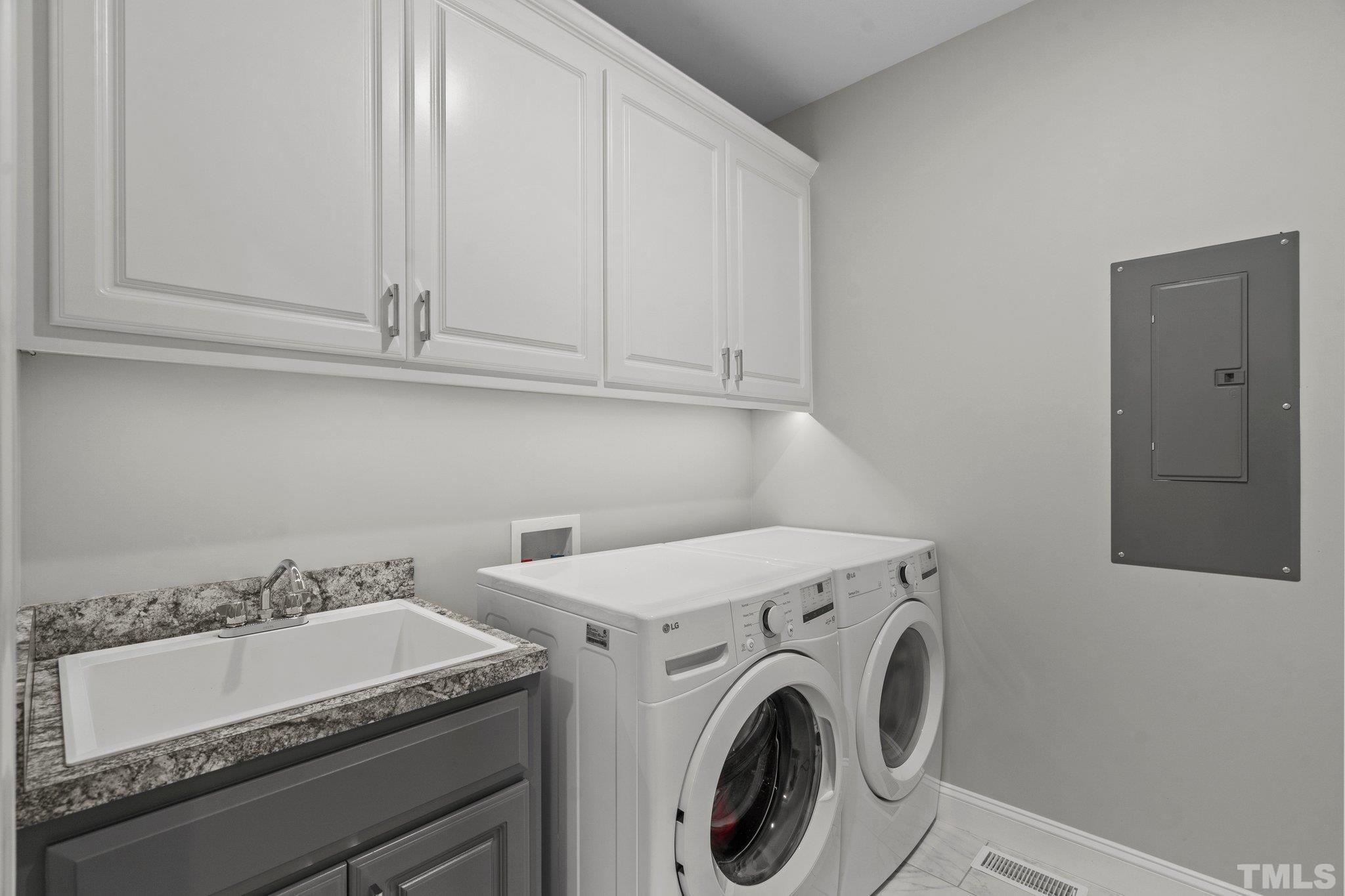 5901 Harvest Rdg Road Battleboro, NC 27809 - Photo 11 of 33 a utility room with dryer and washer