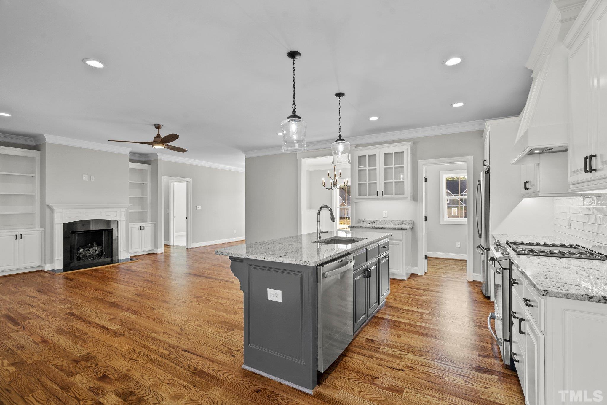 5901 Harvest Rdg Road Battleboro, NC 27809 - Photo 12 of 33 a kitchen with stainless steel appliances granite countertop a stove oven and a refrigerator