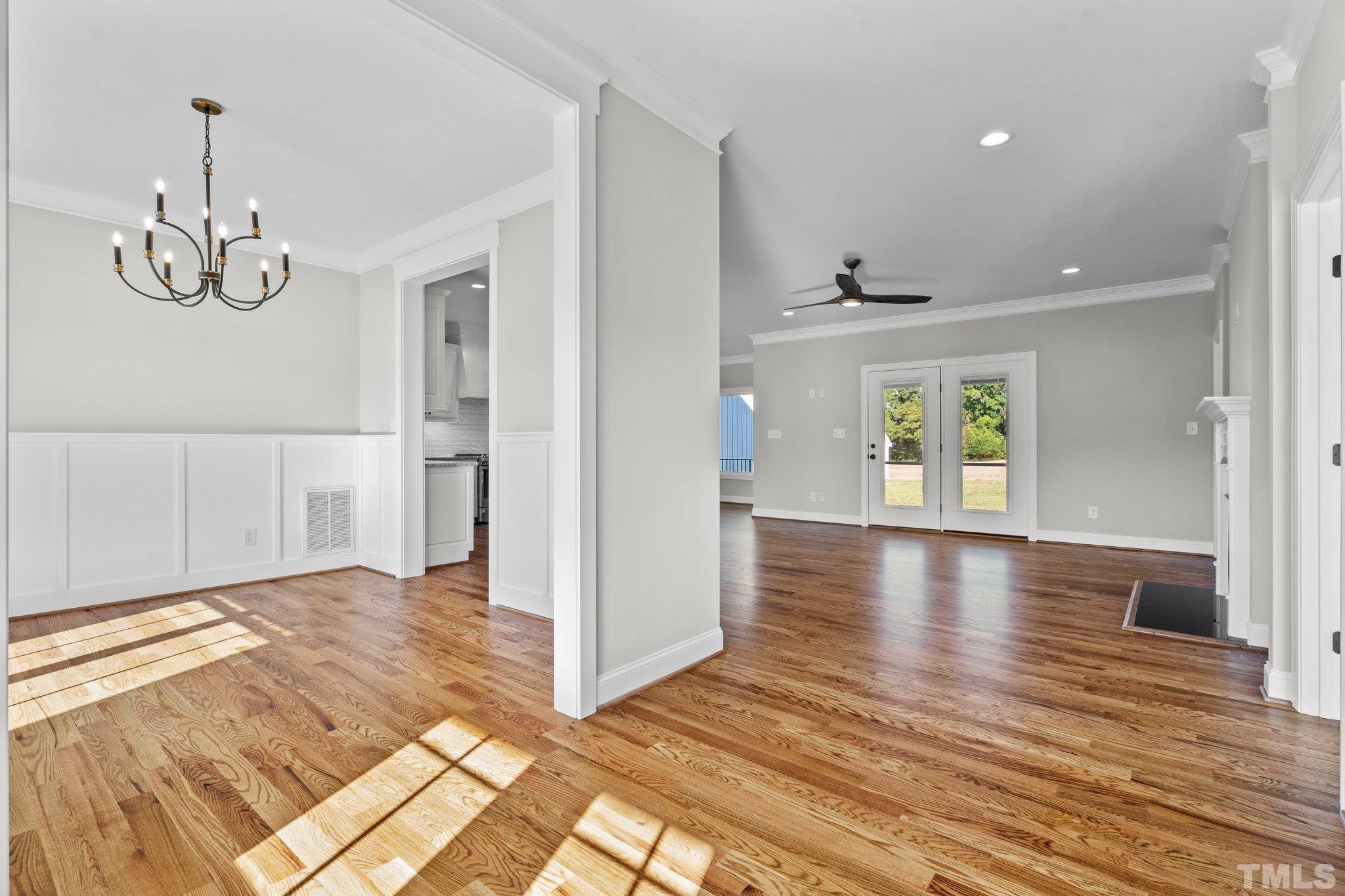 5901 Harvest Rdg Road Battleboro, NC 27809 - Photo 16 of 33 a view of livingroom with hardwood floor and window