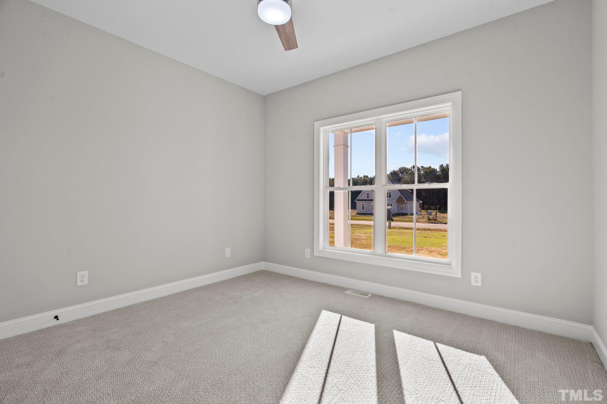 5901 Harvest Rdg Road Battleboro, NC 27809 - Photo 19 of 33 an empty room with windows