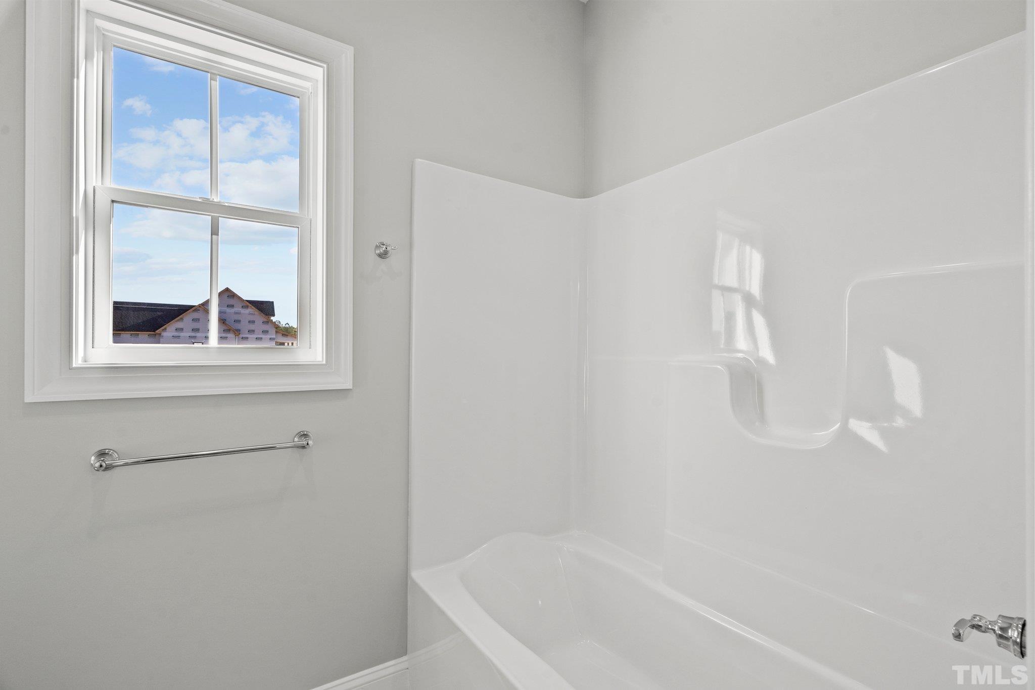 5901 Harvest Rdg Road Battleboro, NC 27809 - Photo 20 of 33 a bath tub sitting next to a window