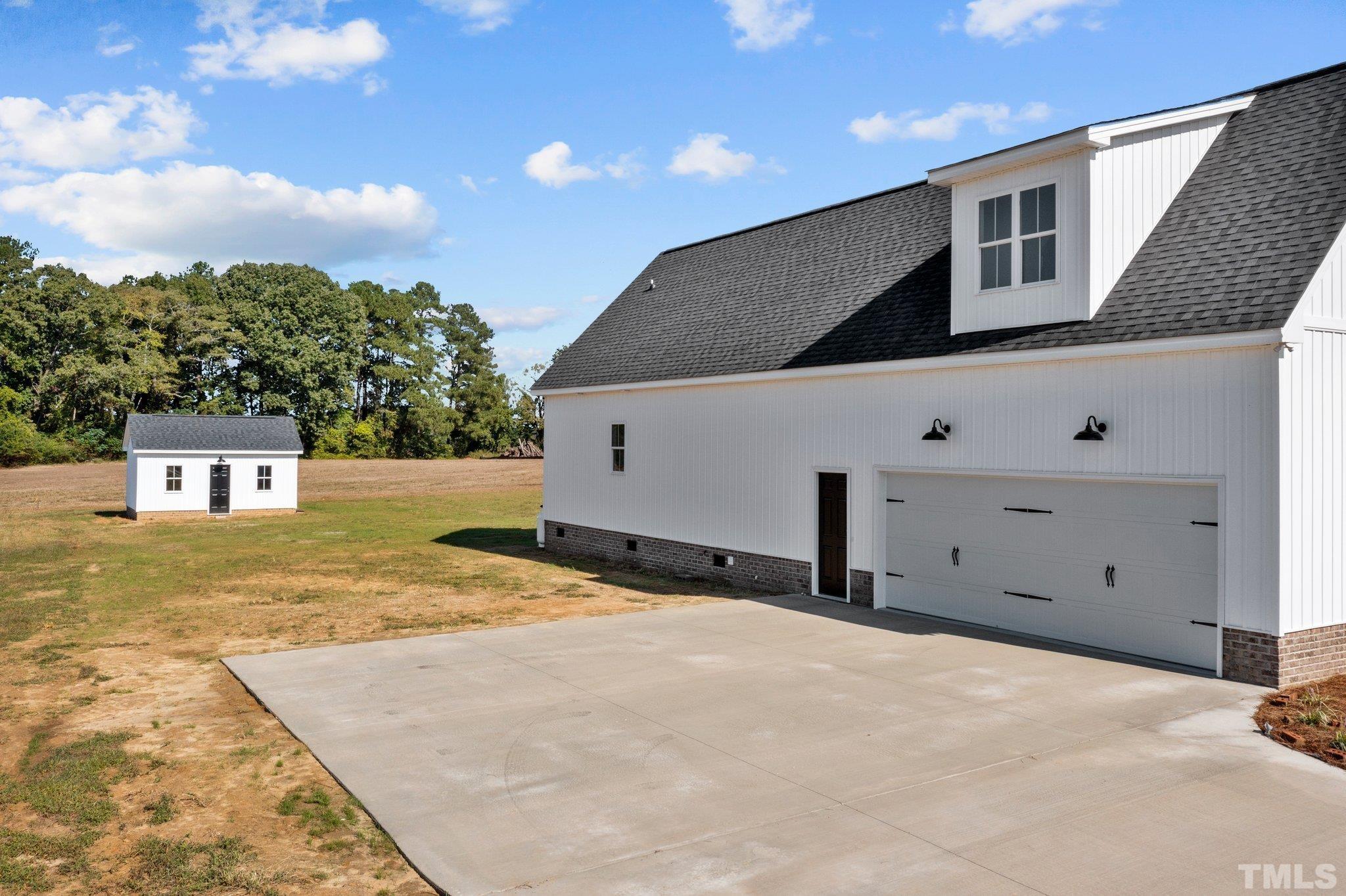 5901 Harvest Rdg Road Battleboro, NC 27809 - Photo 2 of 33 a view of a house with backyard
