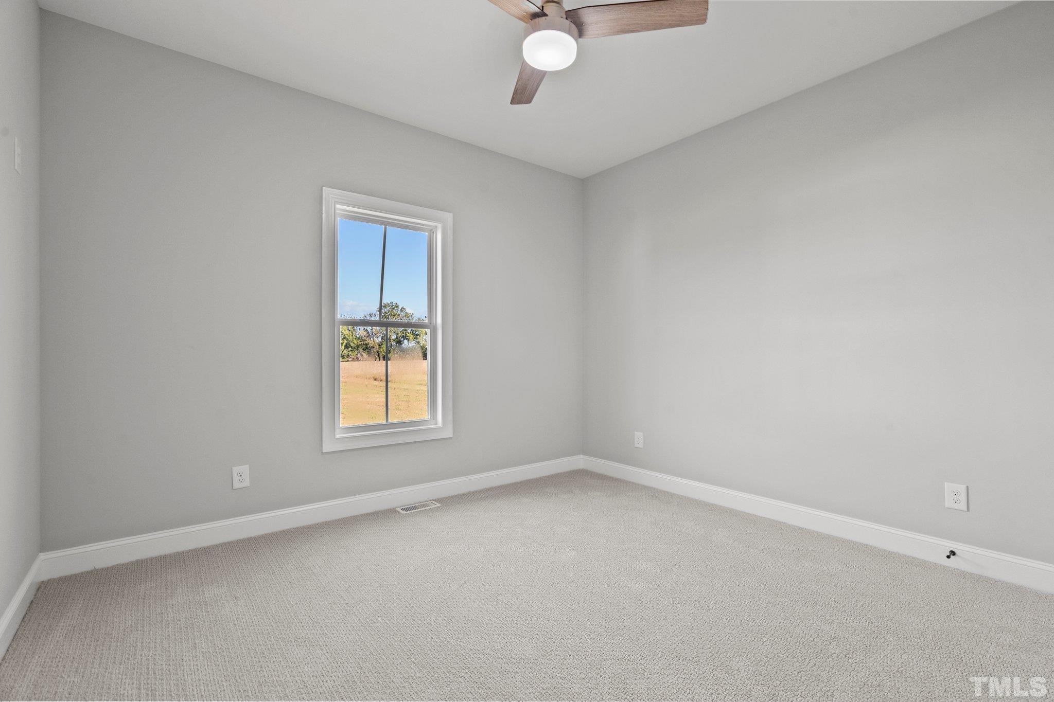 5901 Harvest Rdg Road Battleboro, NC 27809 - Photo 24 of 33 an empty room with a window