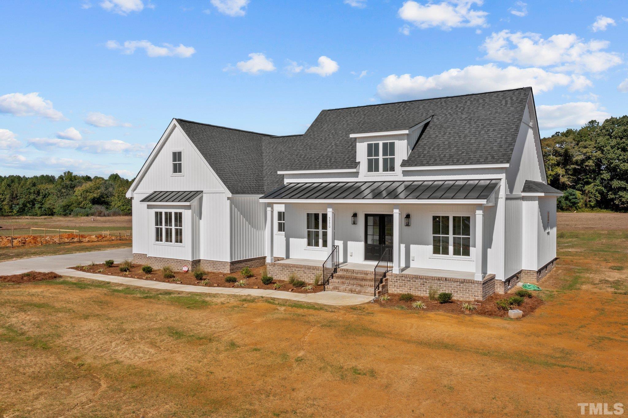 5901 Harvest Rdg Road Battleboro, NC 27809 - Photo 3 of 33 a front view of house with yard