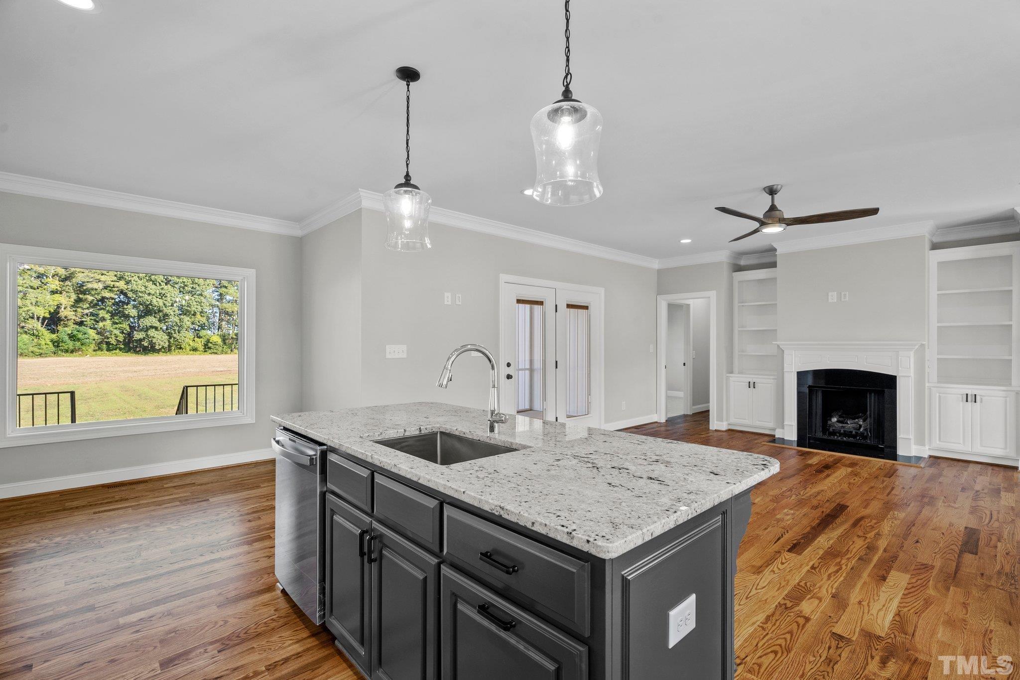 5901 Harvest Rdg Road Battleboro, NC 27809 - Photo 7 of 33 a kitchen with sink cabinets and window