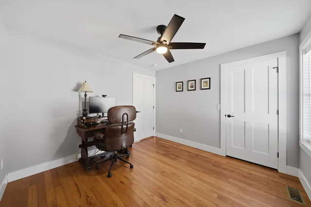 a workspace with chandelier