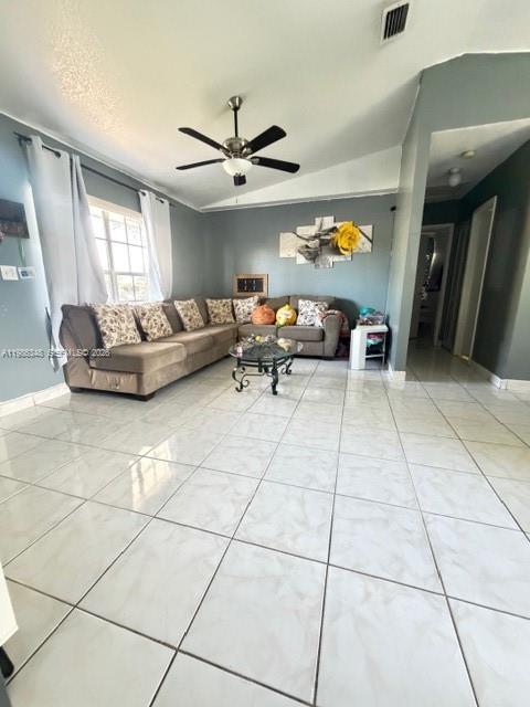 9770 Southwest 210th Street Cutler Bay, FL 33189 - Photo 12 of 32 a living room with couches and kitchen view with wooden floor