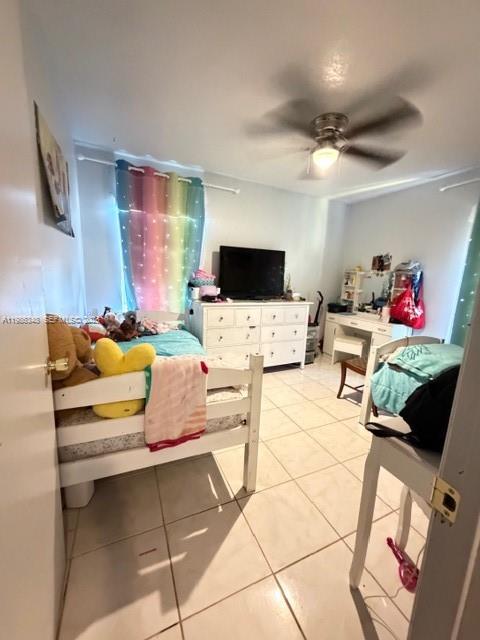 9770 Southwest 210th Street Cutler Bay, FL 33189 - Photo 15 of 32 a living room with furniture and a flat screen tv