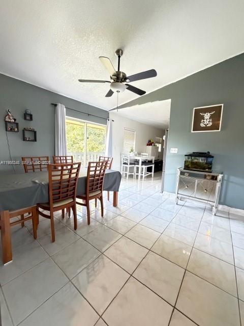 9770 Southwest 210th Street Cutler Bay, FL 33189 - Photo 19 of 32 a view of a dining room with furniture