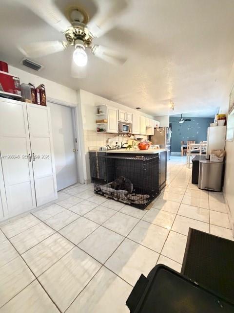 9770 Southwest 210th Street Cutler Bay, FL 33189 - Photo 21 of 32 a view of kitchen with furniture and a chandelier