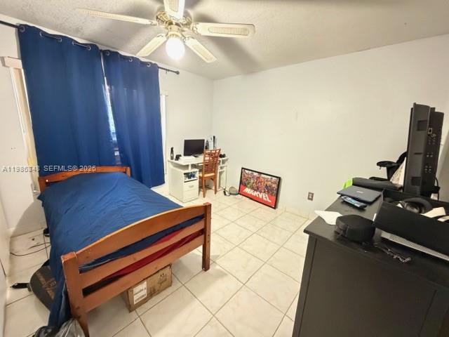 9770 Southwest 210th Street Cutler Bay, FL 33189 - Photo 23 of 32 a reading room with wooden floor and furniture