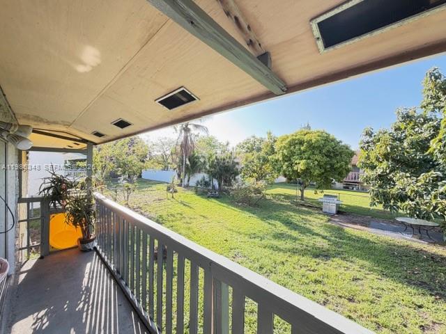 9770 Southwest 210th Street Cutler Bay, FL 33189 - Photo 25 of 32 a view of swimming pool from a balcony