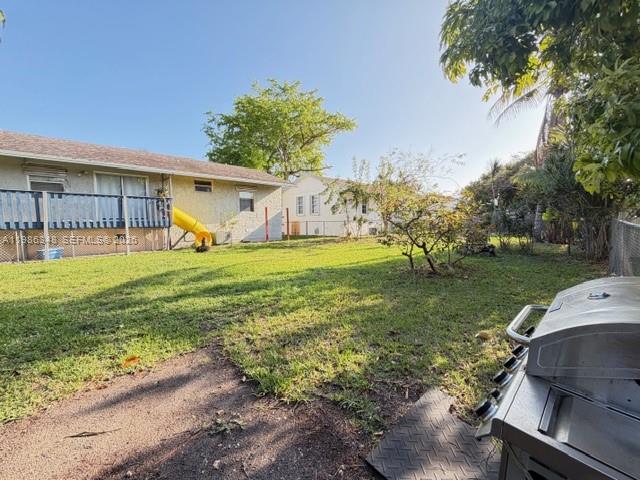 9770 Southwest 210th Street Cutler Bay, FL 33189 - Photo 30 of 32 a view of a backyard with a sitting area