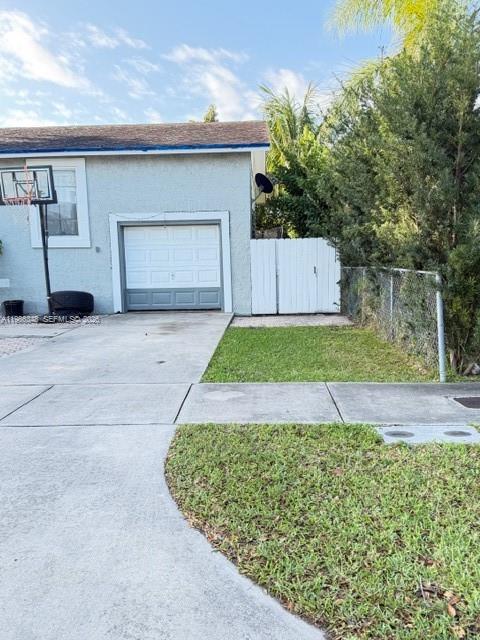 9770 Southwest 210th Street Cutler Bay, FL 33189 - Photo 4 of 32 a view of outdoor space yard and garage