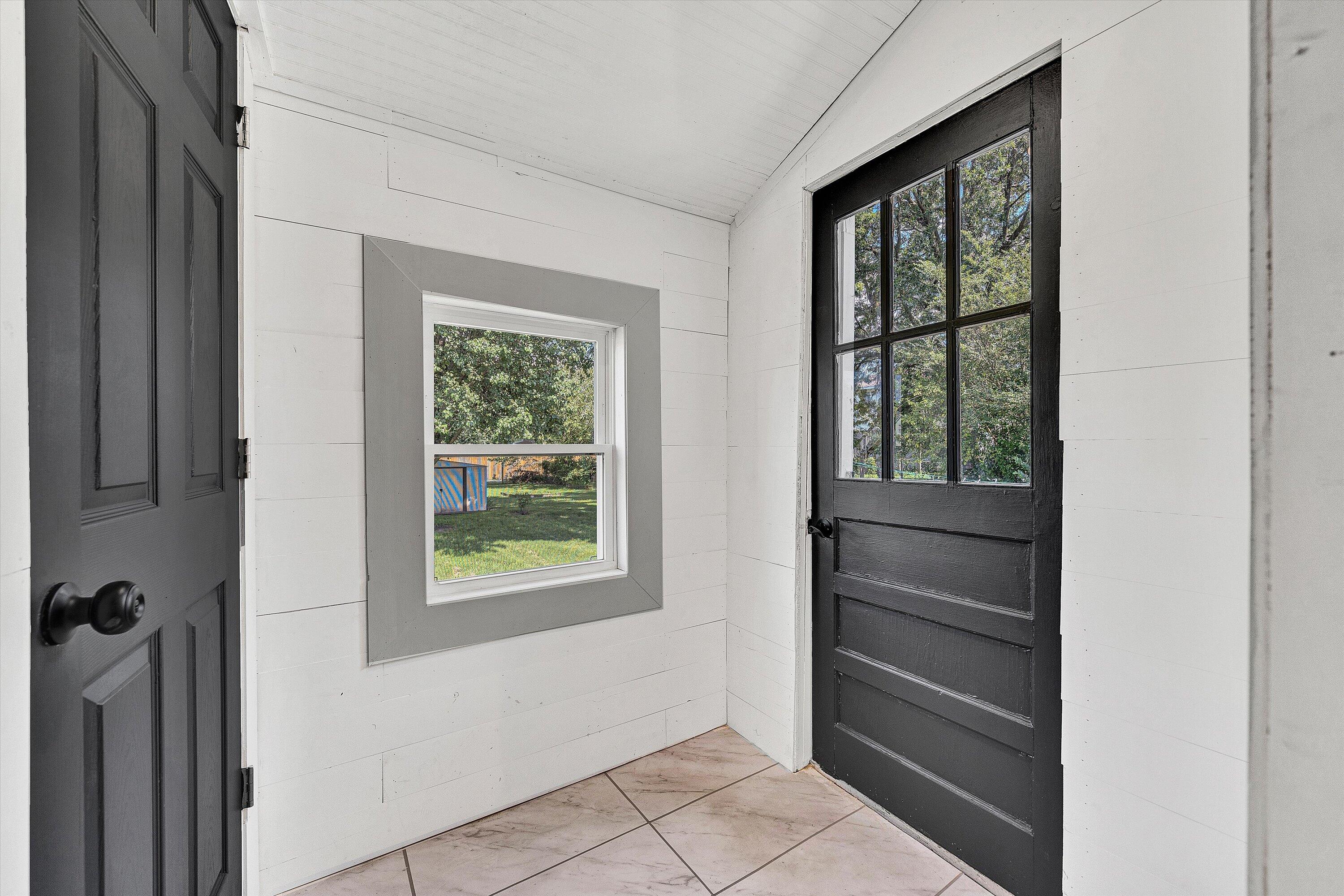 402 7th Street Salem, VA 24153 - Photo 17 of 32 a view of an entryway with wooden floor and a window