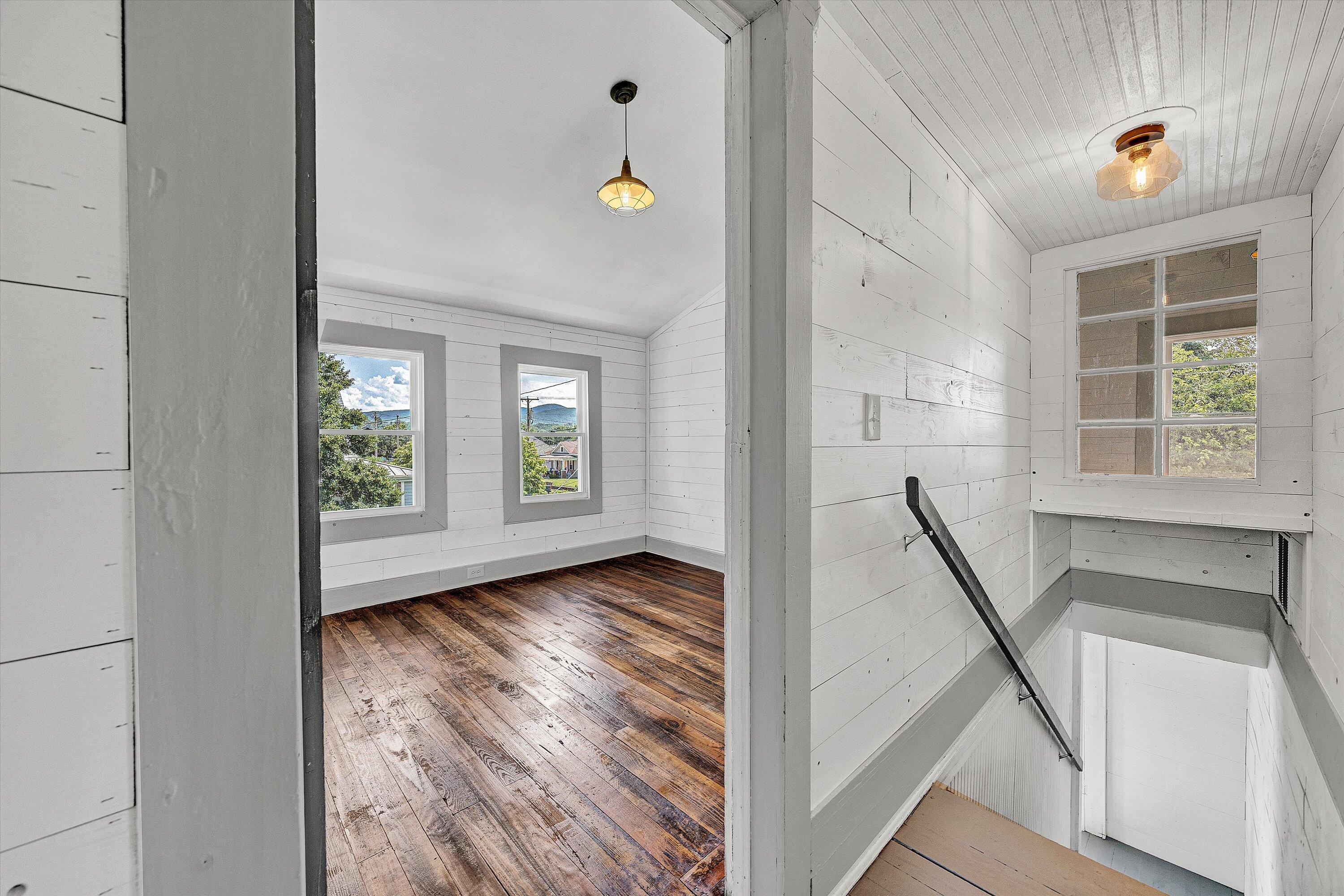402 7th Street Salem, VA 24153 - Photo 19 of 32 a view of an entryway with wooden floor