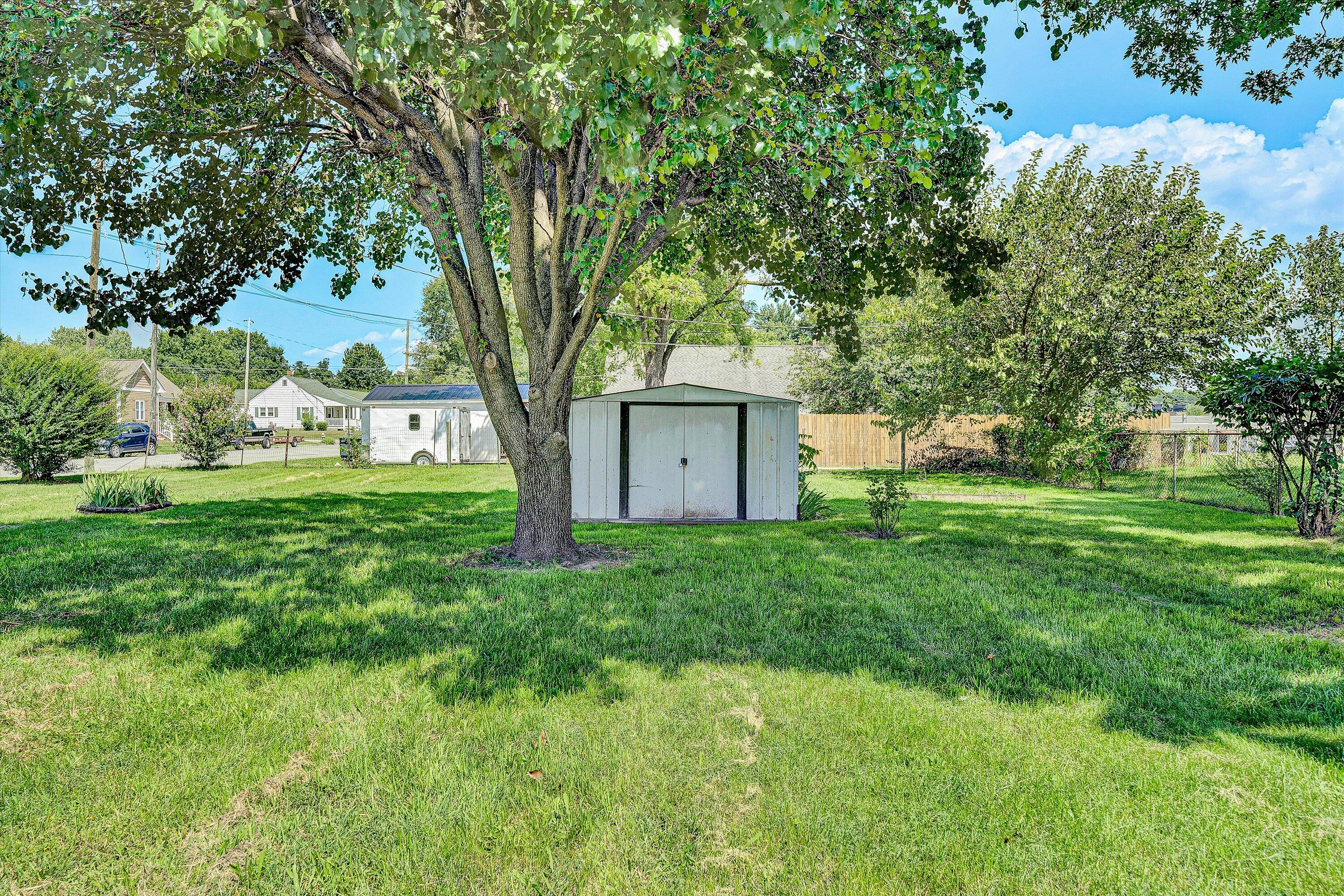 402 7th Street Salem, VA 24153 - Photo 30 of 32 a view of a house with a big yard and large trees