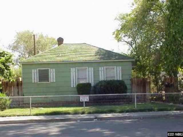 740 East 2nd, Unit 3 Reno, NV 89502 - Photo 1 of 1 a front view of a house with a garden and plants