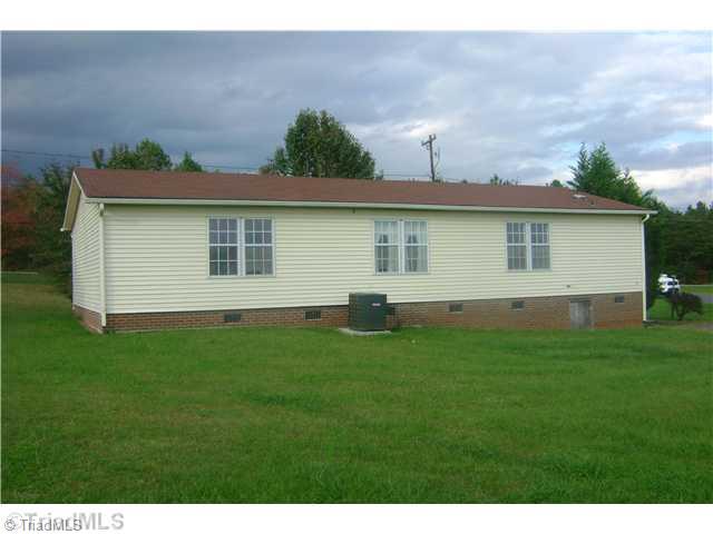 7731 Riverbend Road Claremont, NC 28610 - Photo 2 of 9 Exterior Back.