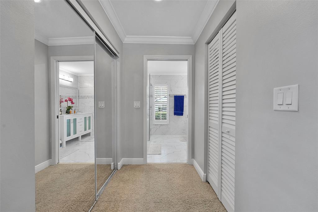 3588 Sahara Springs Boulevard Pompano Beach, FL 33069 - Photo 22 of 41 an entryway with a white walls