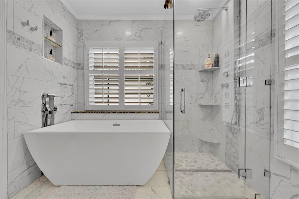 3588 Sahara Springs Boulevard Pompano Beach, FL 33069 - Photo 24 of 41 a bath tub sitting next to a shower