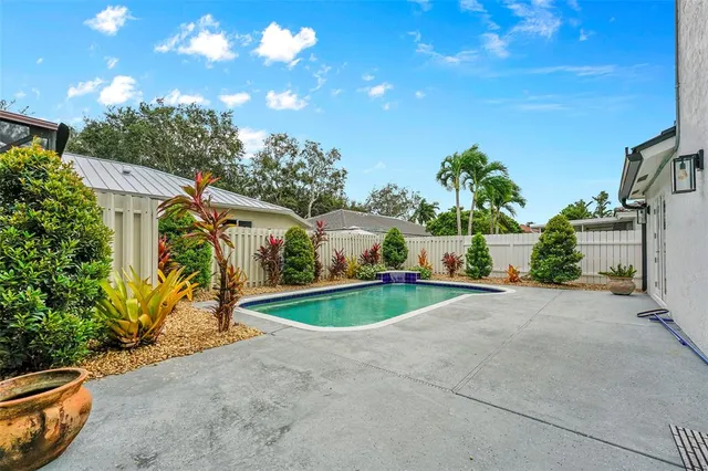 a view of a house with a swimming pool