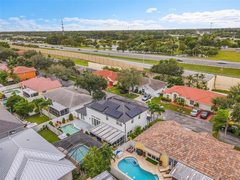 3588 Sahara Springs Boulevard Pompano Beach, FL 33069 - Photo 32 of 41 an aerial view of residential houses with outdoor space and ocean view