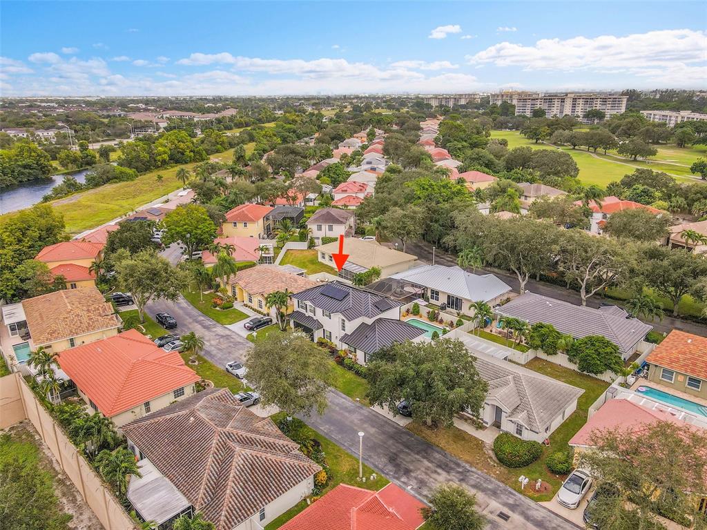3588 Sahara Springs Boulevard Pompano Beach, FL 33069 - Photo 36 of 41 an aerial view of residential houses with outdoor space