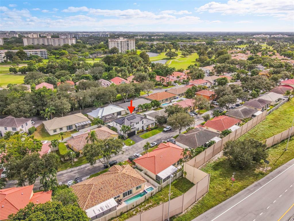 3588 Sahara Springs Boulevard Pompano Beach, FL 33069 - Photo 39 of 41 an aerial view of residential houses with outdoor space