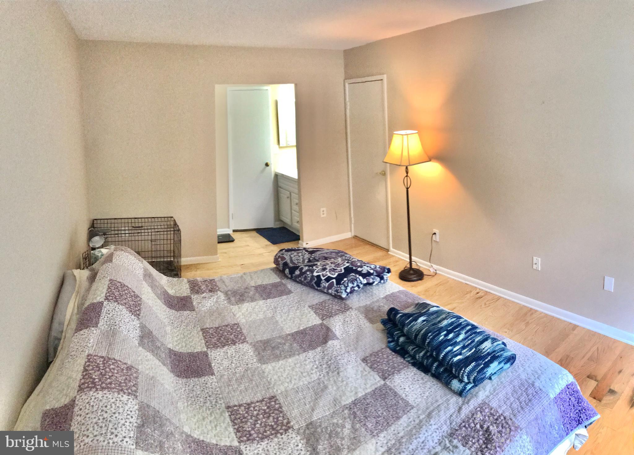 2214 Springwood Drive, Unit 104 Reston, VA 20191 - Photo 19 of 27 Master Bedroom