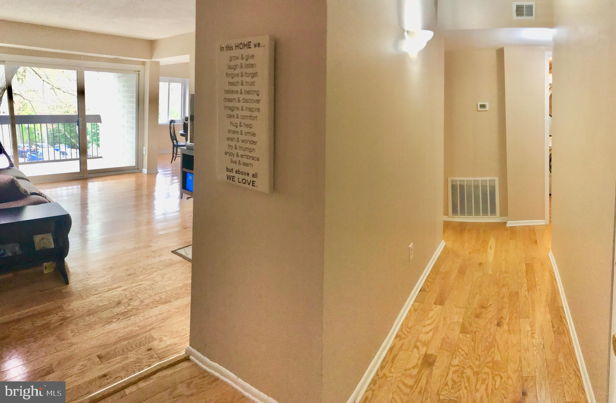 2214 Springwood Drive, Unit 104 Reston, VA 20191 - Photo 5 of 27 Living room entrance