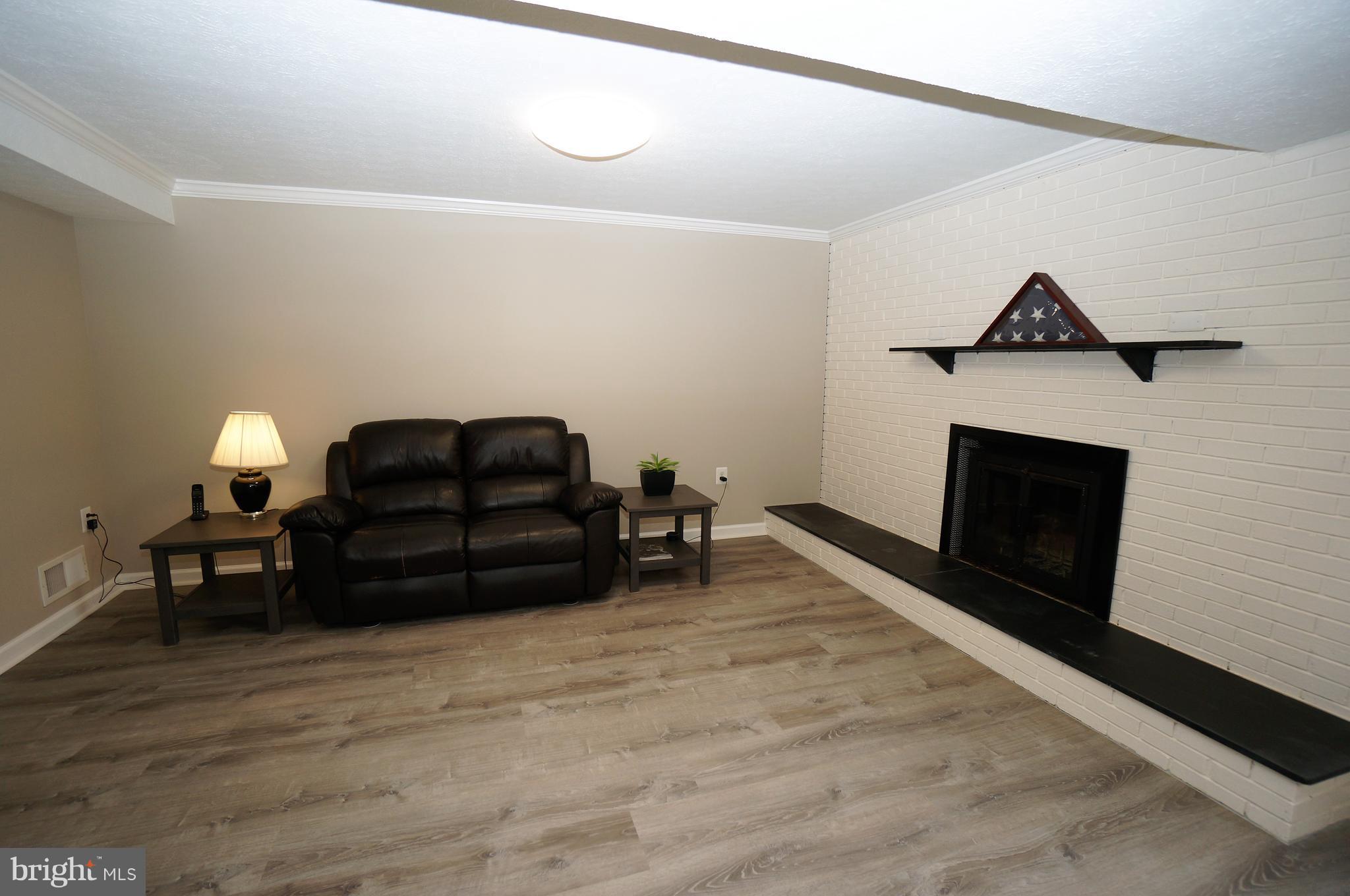 2000 Edgewater Parkway Silver Spring, MD 20903 - Photo 22 of 29 Clubroom with Brick Raised Hearth FP