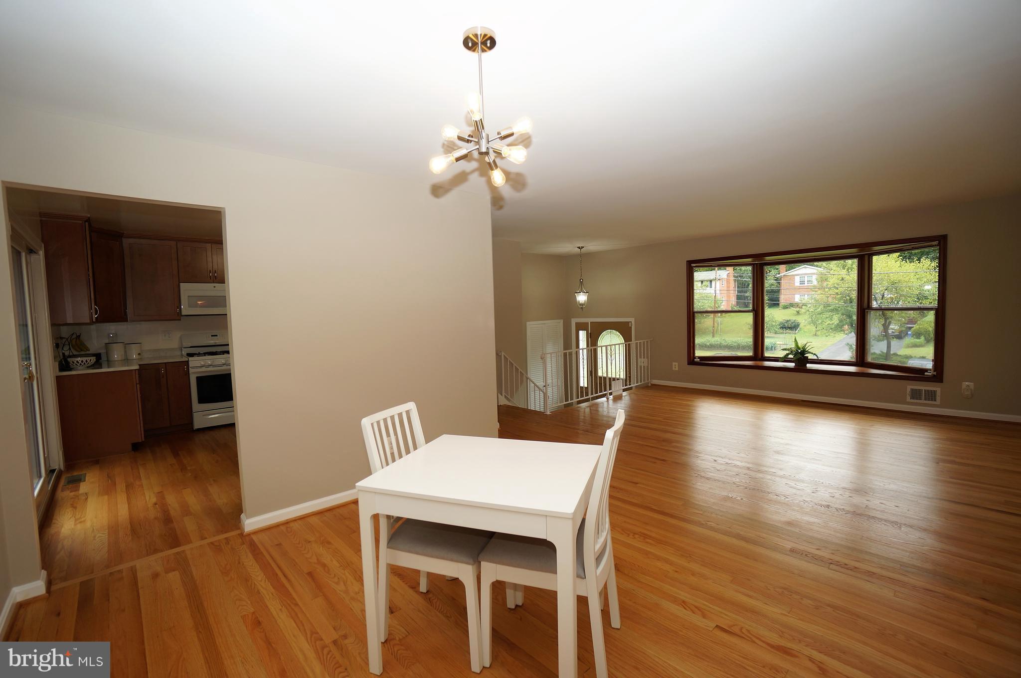 2000 Edgewater Parkway Silver Spring, MD 20903 - Photo 7 of 29 Dining Room with Oak Flooring