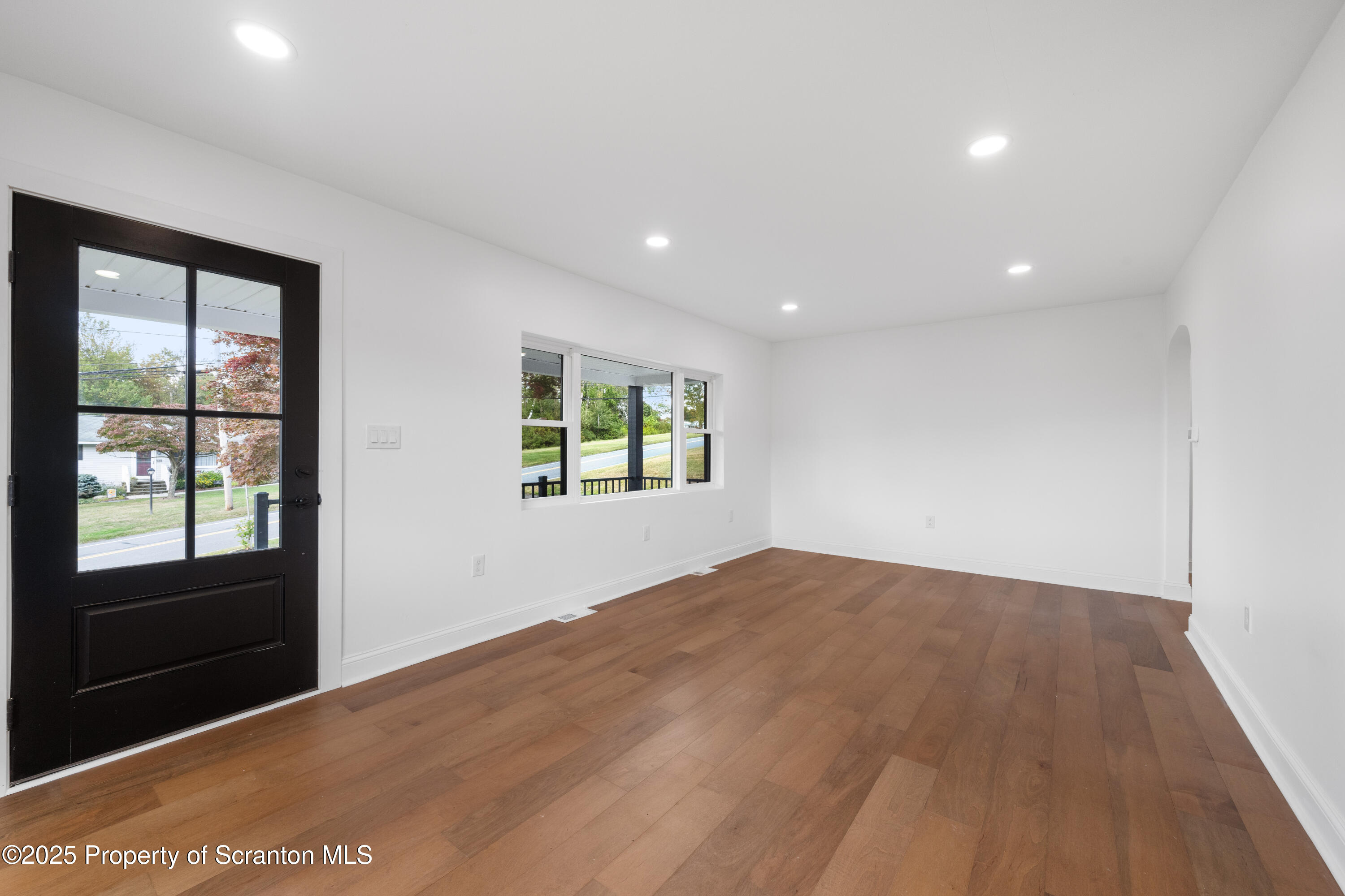 630 Layton Road Clarks Summit, PA 18411 - Photo 19 of 58 wooden floor in an empty room with a window