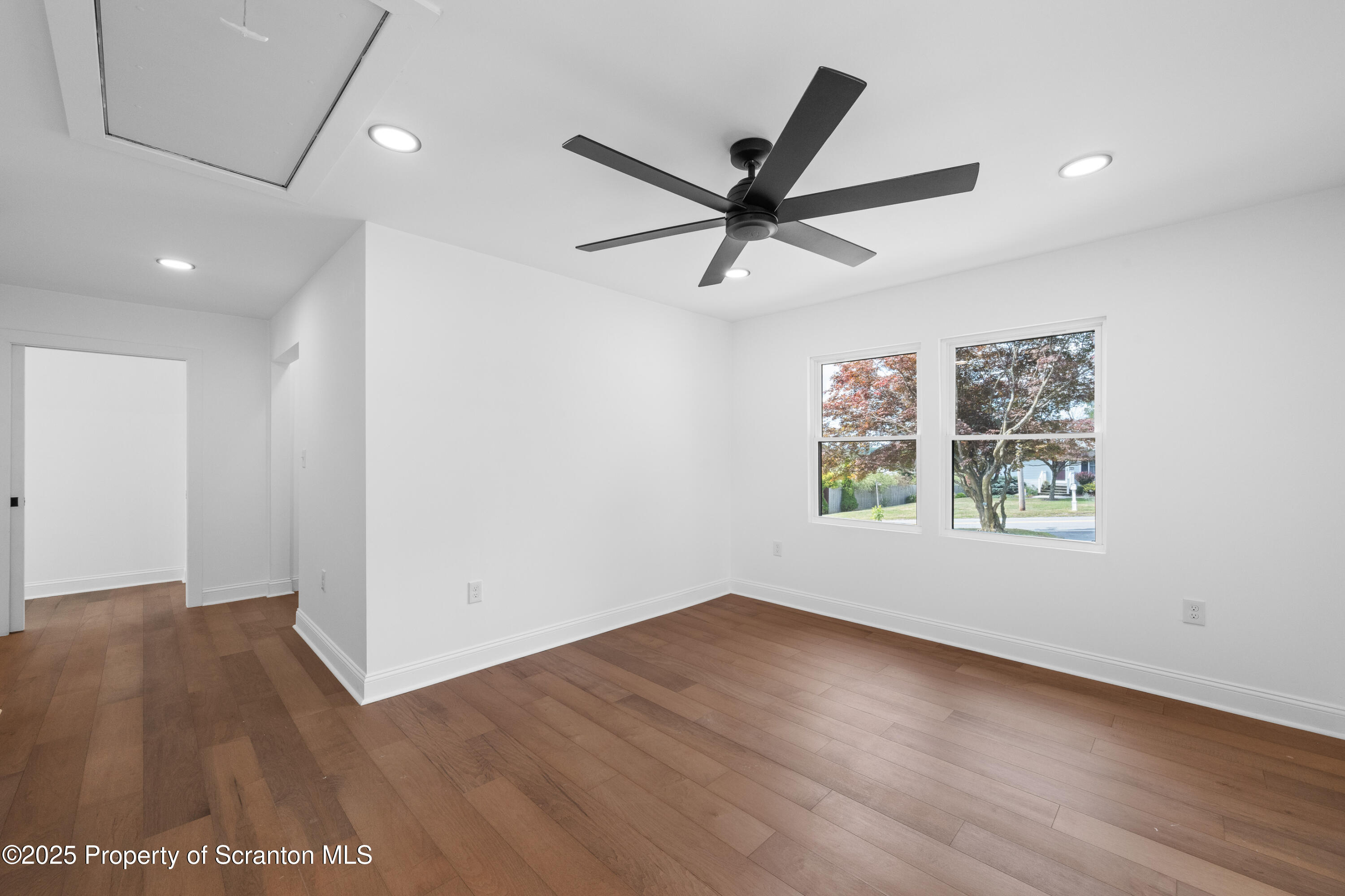 630 Layton Road Clarks Summit, PA 18411 - Photo 34 of 58 a view of room with wooden floor and window