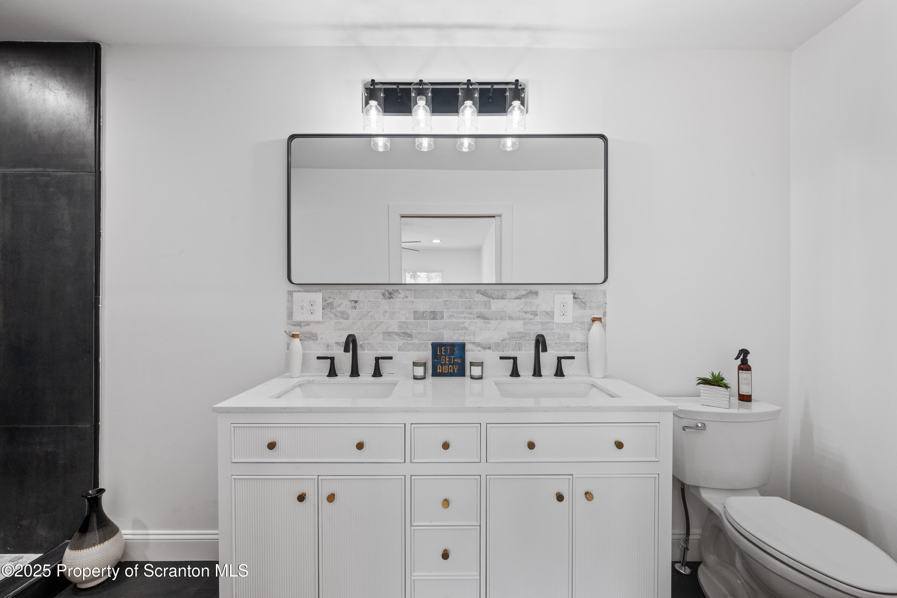 630 Layton Road Clarks Summit, PA 18411 - Photo 37 of 58 a bathroom with a sink and a toilet