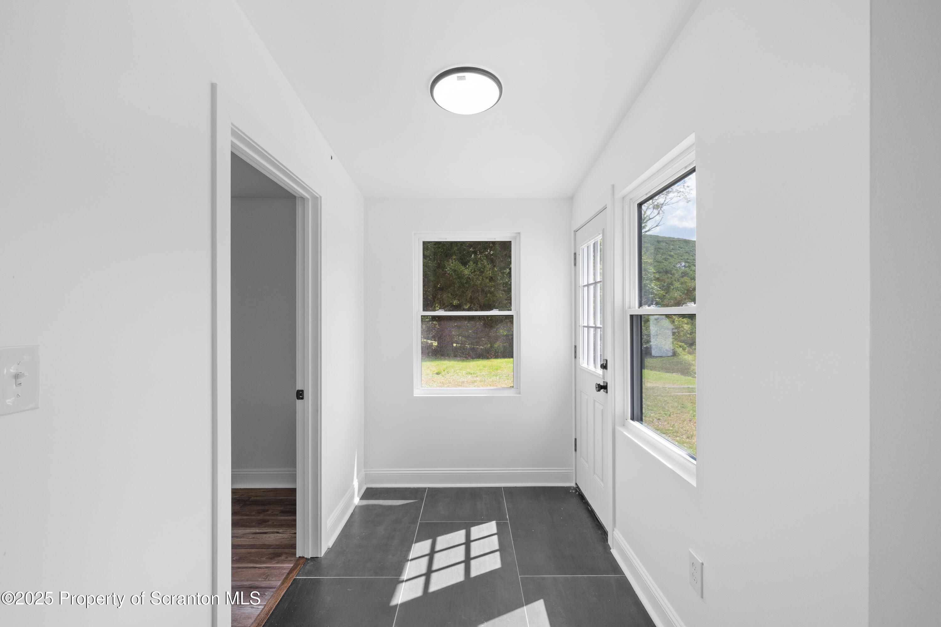 630 Layton Road Clarks Summit, PA 18411 - Photo 42 of 58 a view of an empty room with a window