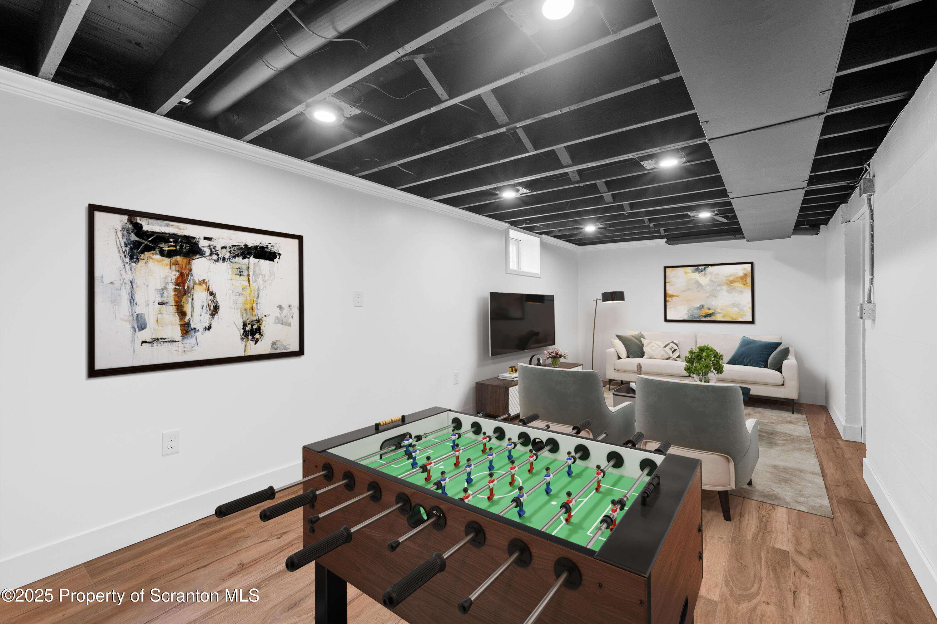 630 Layton Road Clarks Summit, PA 18411 - Photo 48 of 58 a living room with furniture and a wooden floor