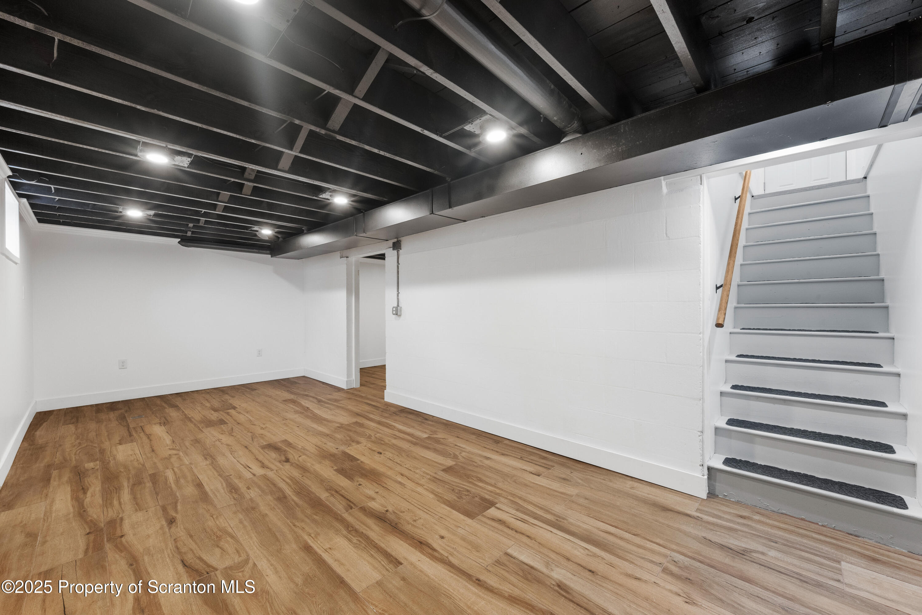 630 Layton Road Clarks Summit, PA 18411 - Photo 52 of 58 a view of empty room with wooden floor