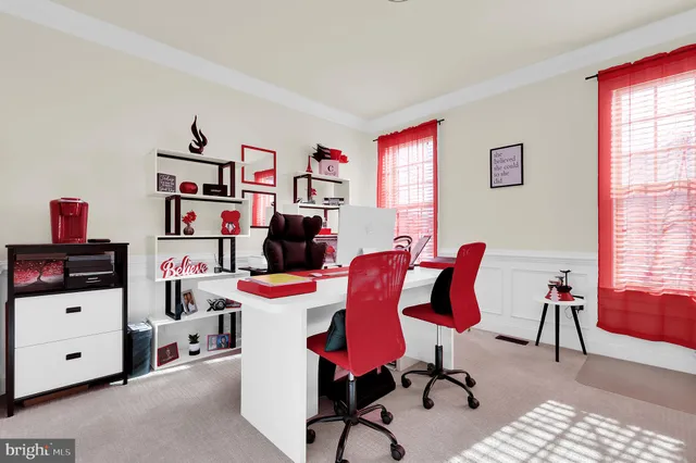 a view of a hallway with windows