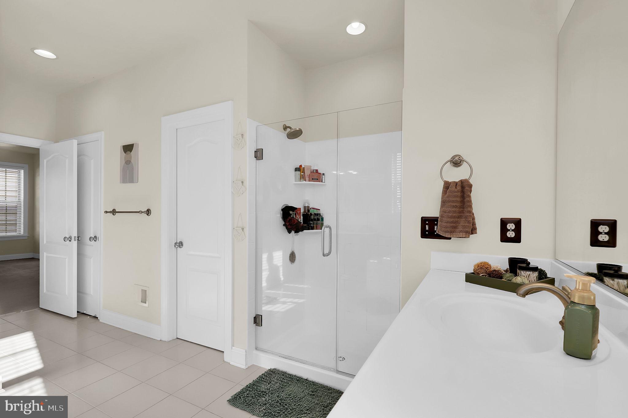 1305 Moore Spring Court Brunswick, MD 21716 - Photo 20 of 64 a view of kitchen center island and living room