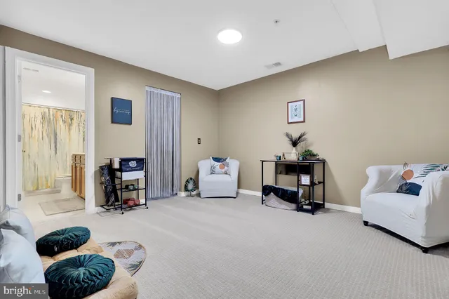 a room with furniture and air hockey table