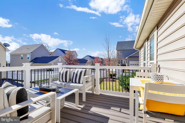 a view of a house with snow on the road