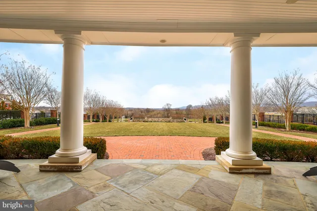 a view of a terrace with chairs