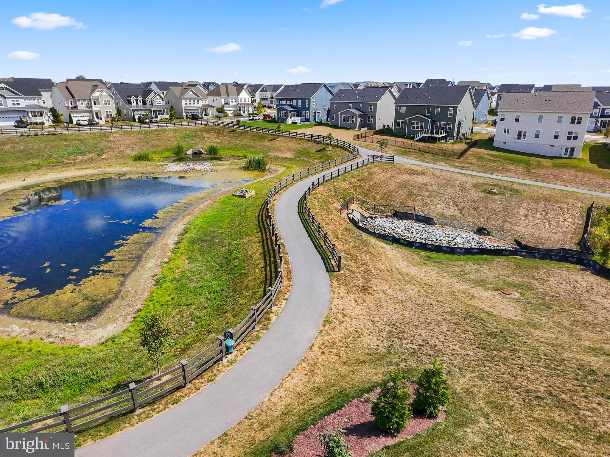 1305 Moore Spring Court Brunswick, MD 21716 - Photo 57 of 64 a view of a swimming pool and an ocean view