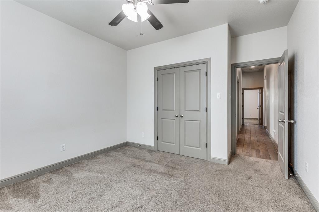 1029 Sunflower Paradise, TX 76073 - Photo 17 of 38 an empty room with fan