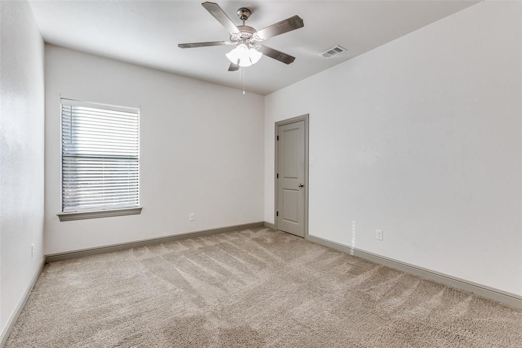 1029 Sunflower Paradise, TX 76073 - Photo 18 of 38 a view of an empty room with a window
