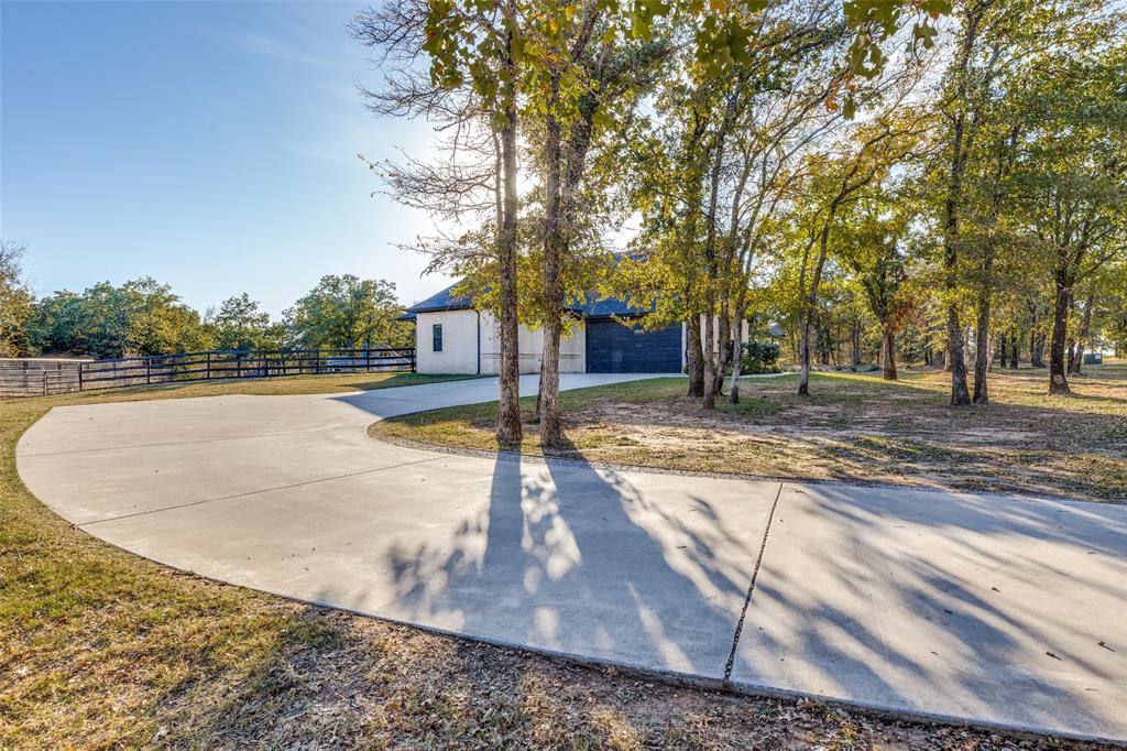 1029 Sunflower Paradise, TX 76073 - Photo 4 of 38 a view of a swimming pool with an outdoor space