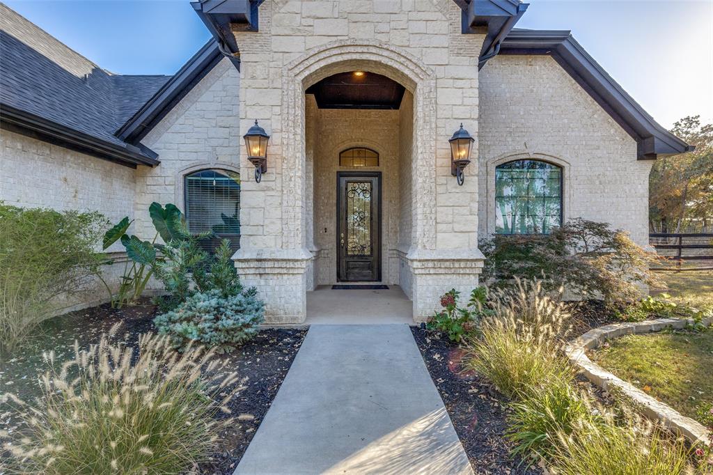 1029 Sunflower Paradise, TX 76073 - Photo 6 of 38 a front view of a house with garden