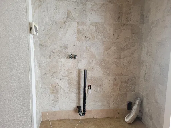 a view of a bathroom with wooden floor